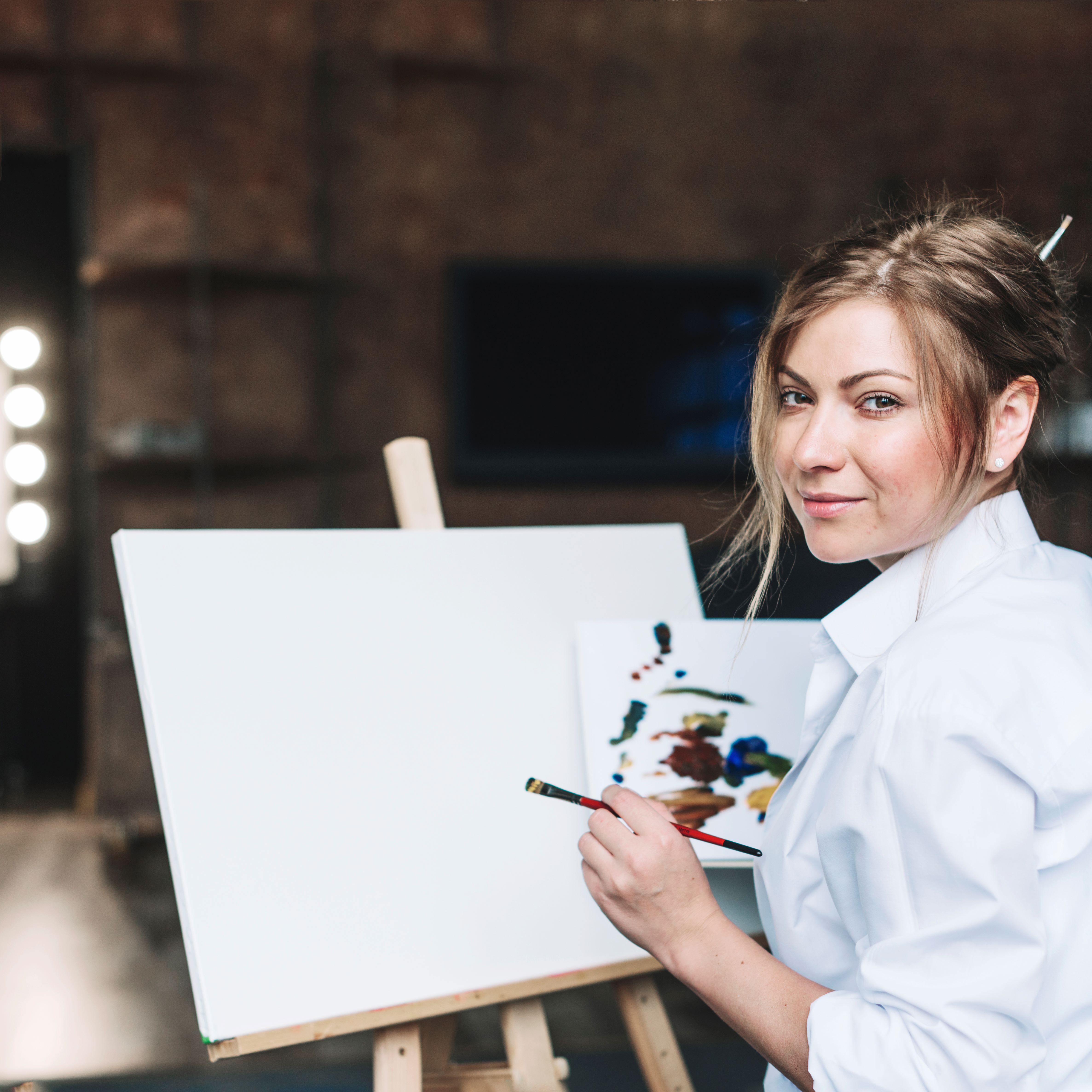 female-artist-front-blank-canvas